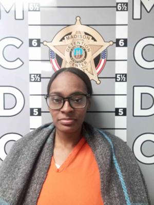 Richmond woman accused of providing car used in armed home invasion; tied to organized crime probe