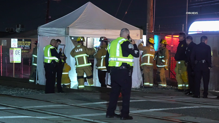 Woman lying on tracks struck and killed by train in San Fernando Valley