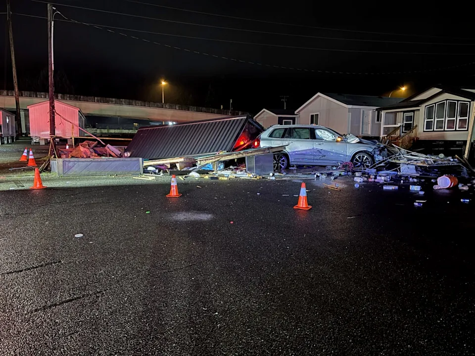 Christmas Eve crash injures four, wrecks coffee stand in Gorst