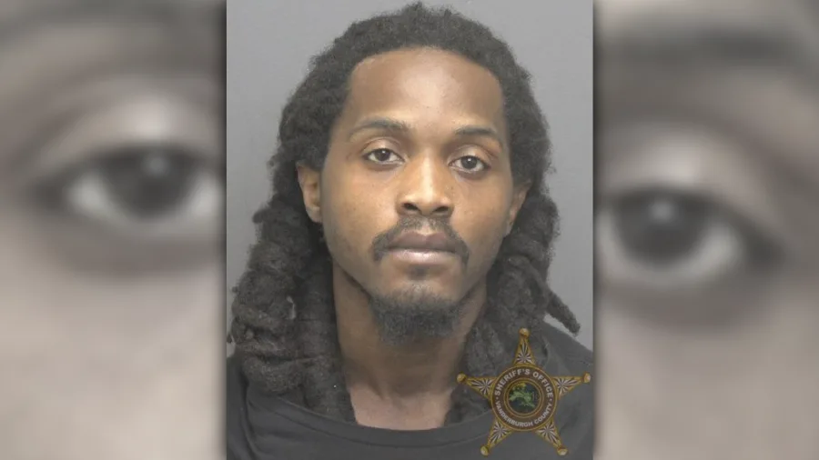 Man arrested after gun fired in neighbor dispute