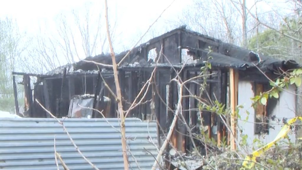 Child’s shoe left abandoned among rubble in heartbreaking pictures after two toddlers and baby killed in house fire
