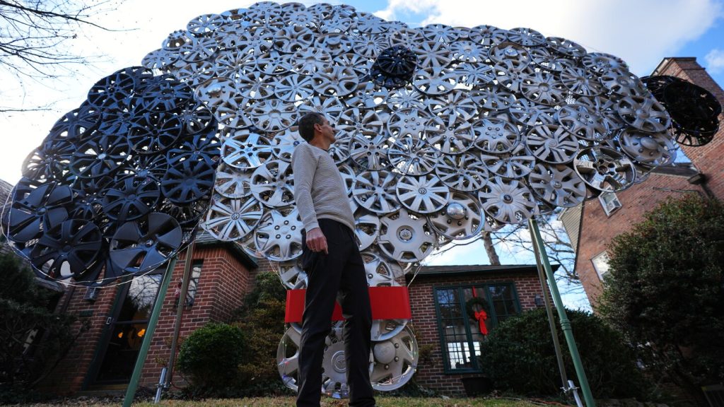 Baltimore cyclist crafts artwork from lost hubcaps