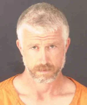 COPS: Man walks in on woman at home