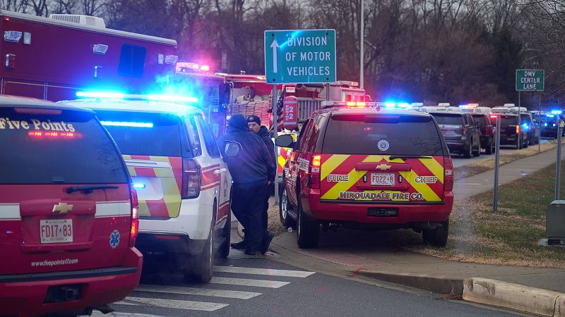Gunman at Delaware DMV let customers leave and fired at approaching officers, state police say | CNN