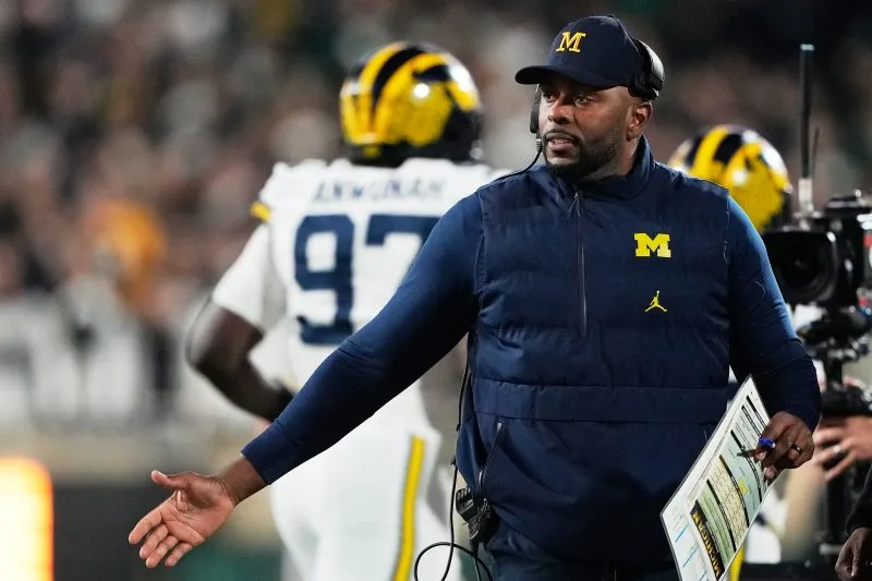 Fired Michigan football coach Sherrone Moore charged with stalking, home invasion