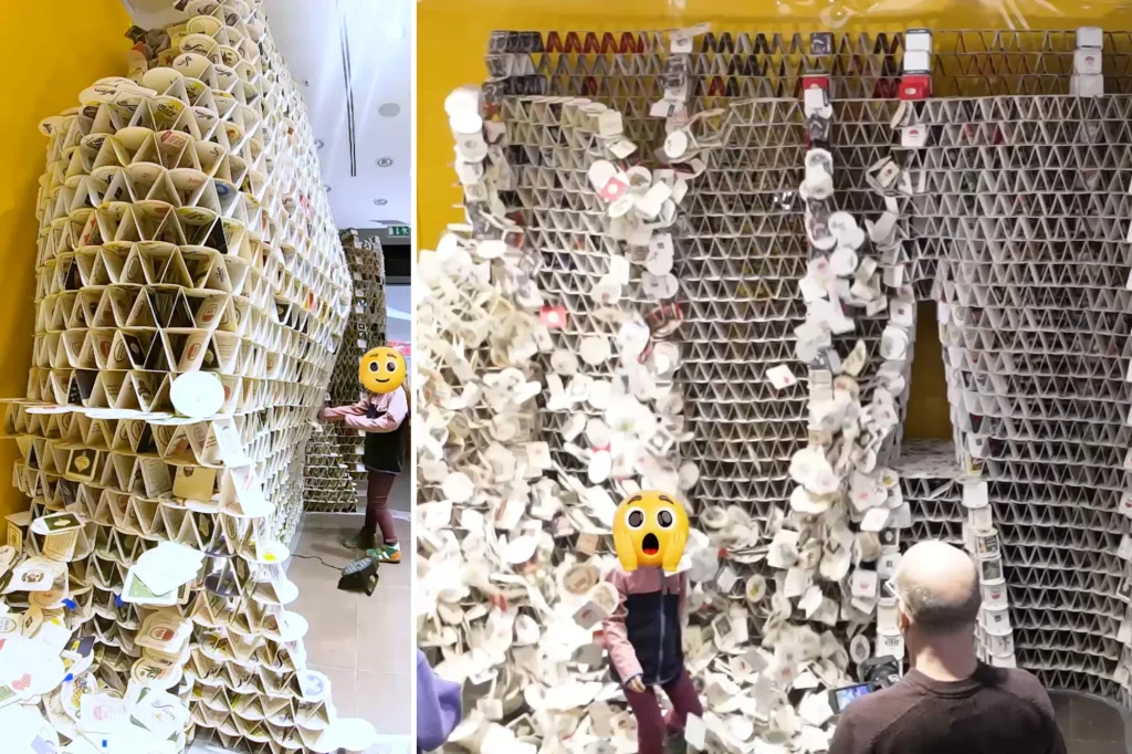 Young girl breaks Guinness Record with tower of 63,000 beer coasters