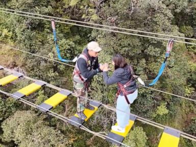 Couple takes marriage proposals to new heights with skydiving engagement