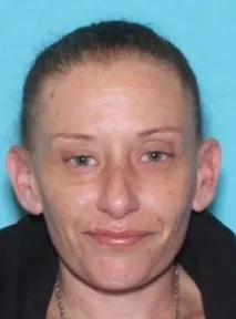 A missing CT woman was found dead in a wooded area. Her cause of death is still a mystery.