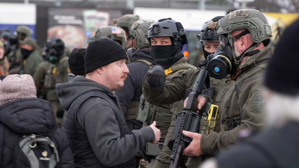 Protesters clash with federal officers after deadly ICE shooting