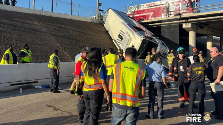 Houston METRO bus lifted off embankment after falling from elevated highway