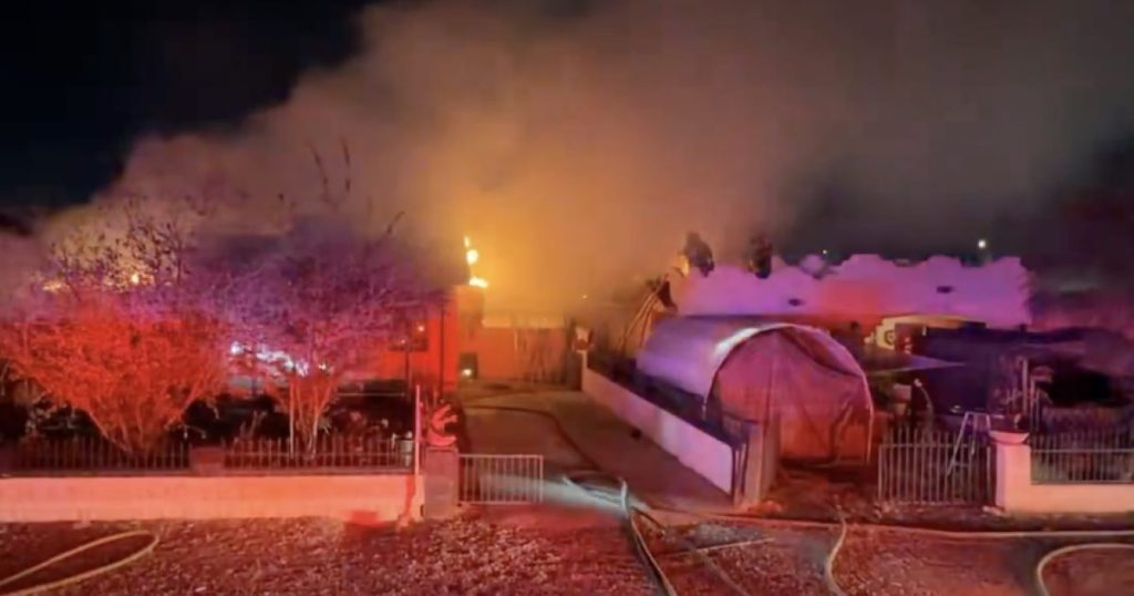 Firefighters battle triple house fire in west Phoenix