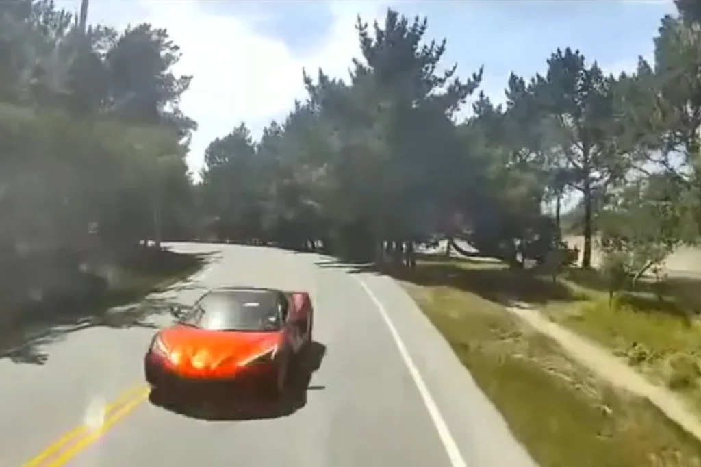 Heart-stopping dashcam footage shows Corvette smash head-on into packed tour bus