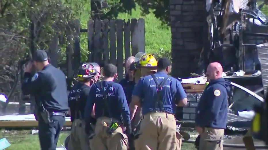 Small plane crashes into Ohio home, igniting blaze