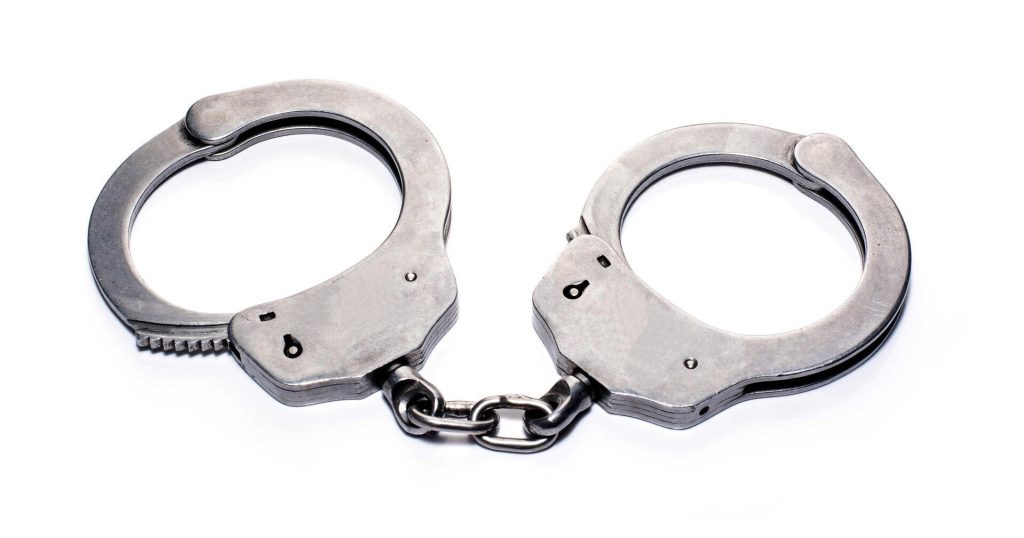 Second Man Arrested in Shoe Store Shooting Death
