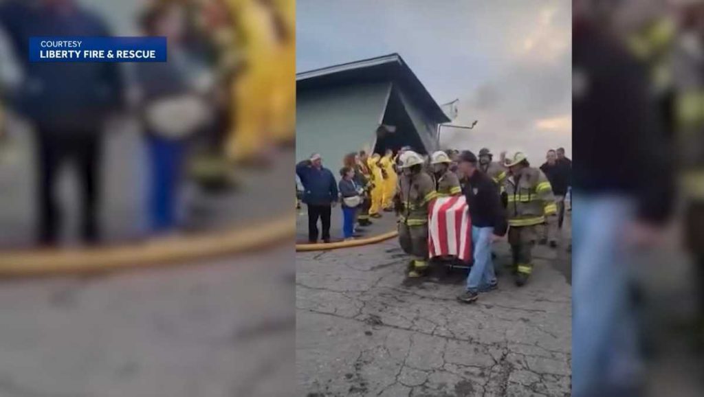 Watch: Firefighter's body removed from fire in Searsmont, Maine