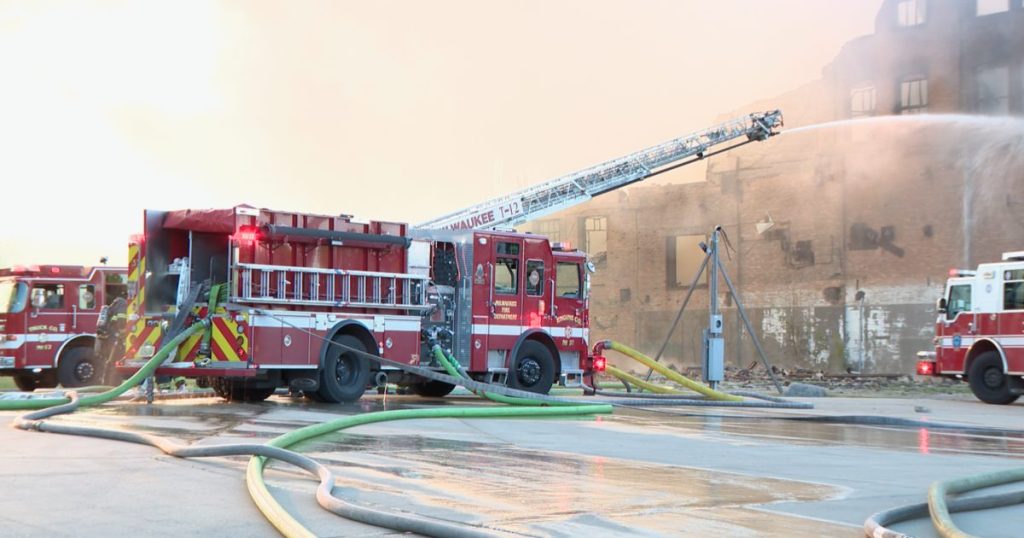 Woman charged after cigarette sparks massive fire