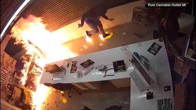 WATCH: Suspect catches fire during Michigan cannabis shop arson attempt