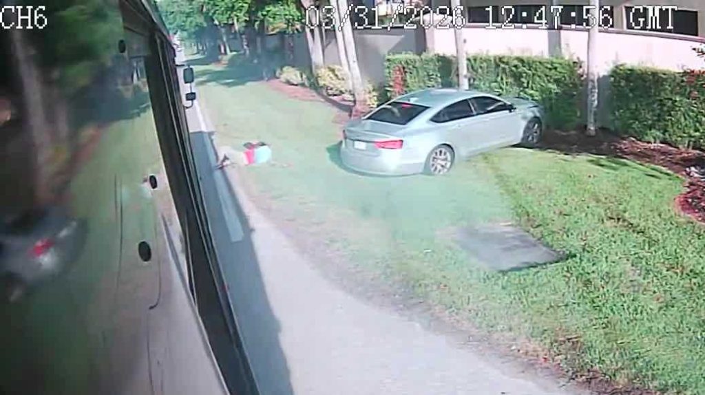Driver hits 14-year-old girl with car at school bus stop