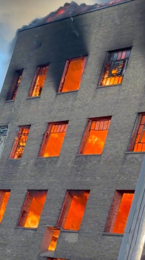 Woman arrested in connection to warehouse fire