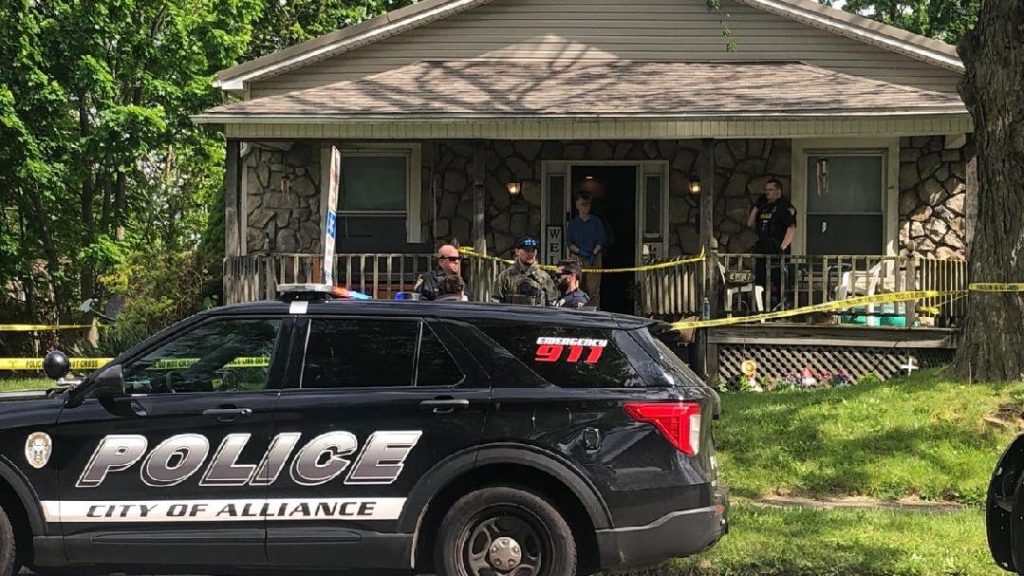 Child Discovers Mother's Body, Police Hunt for Homicide Suspect