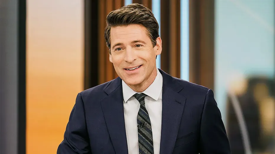 CBS anchor frantically calls for doctor as cameraman collapses