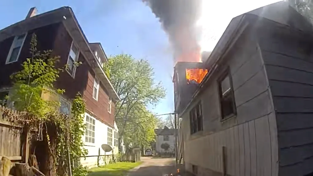 Officer Urges Mother To Throw Her Baby From Burning Home