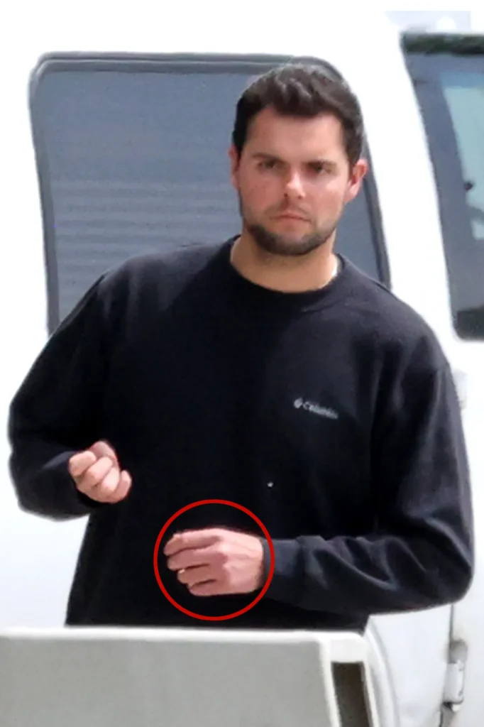 Husband of accused perv teacher seen without wedding ring