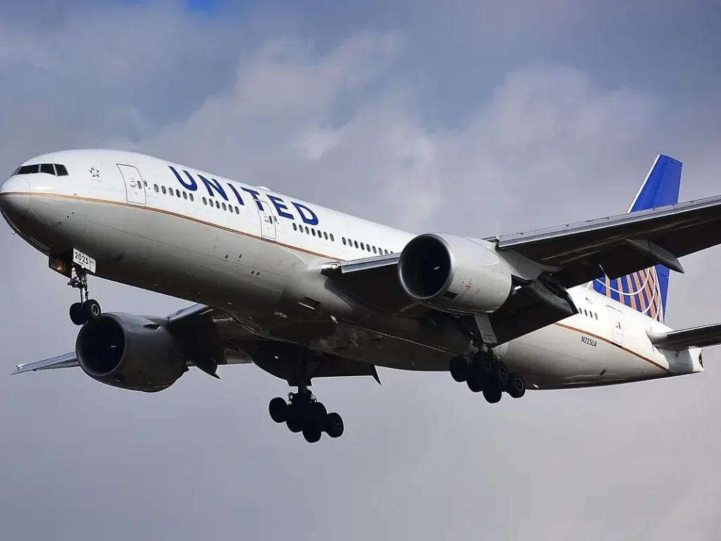 United Flight Emergency Landing After Passenger's Mid-Flight Door Attempt