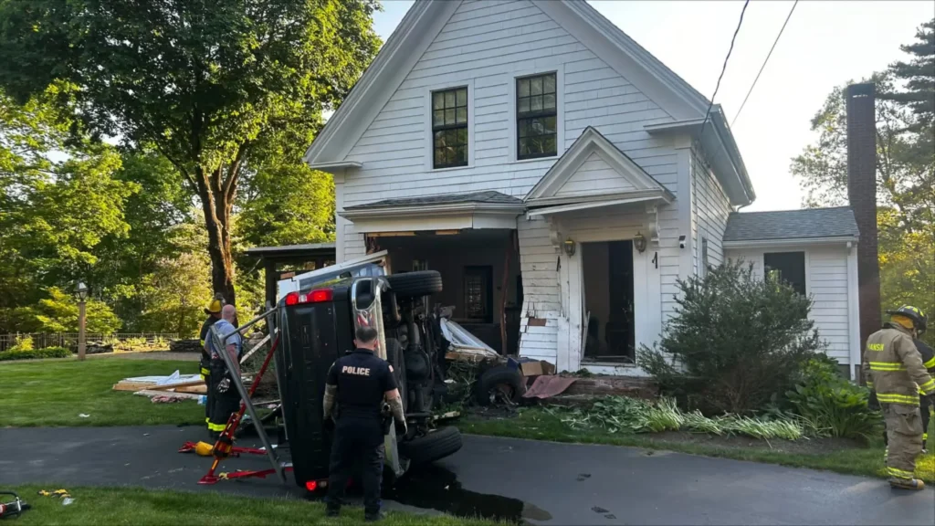 Driver dies after truck crashes into Hanson home