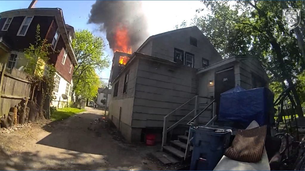 Officer Arnett's Heroic Catch Saves Baby in Kalamazoo Fire Rescue