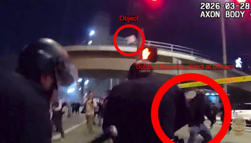 Teen Anti-ICE Rioter Caught on Camera Hurling Object at Officers