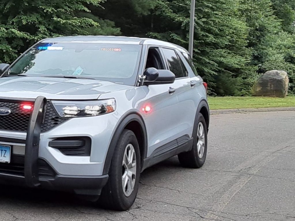 Tesla Hits Tree After Clearing Wall in Willington, Two Injured